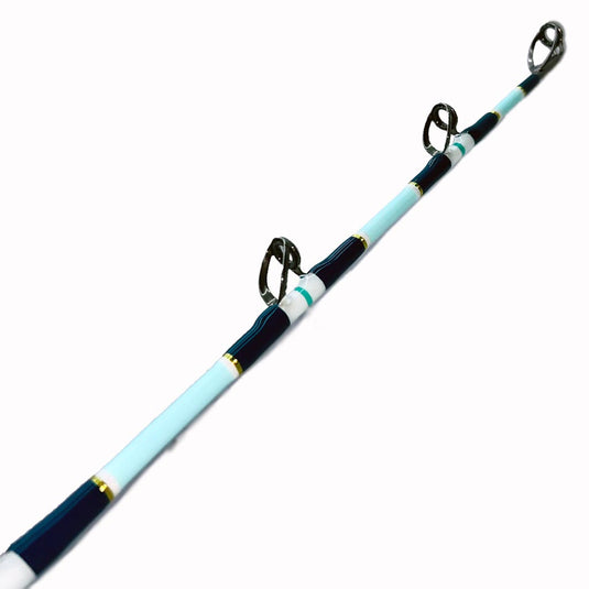 Built just like our Fin 139, this beautiful rod comes equipped with Big Game Cork, Black Winthrop Epic Butt, Fuji heavy duty guides and top. Navy blue, gold, teal, and white trims. two guide eyes showing with top. 
