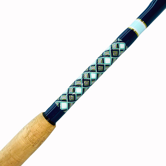 Built just like our Fin 139, this beautiful rod comes equipped with Big Game Cork, Black Winthrop Epic Butt, Fuji heavy duty guides and top. Navy blue, teal, gold, and white diamond butt wrap showing. Partial cork grip showing. 