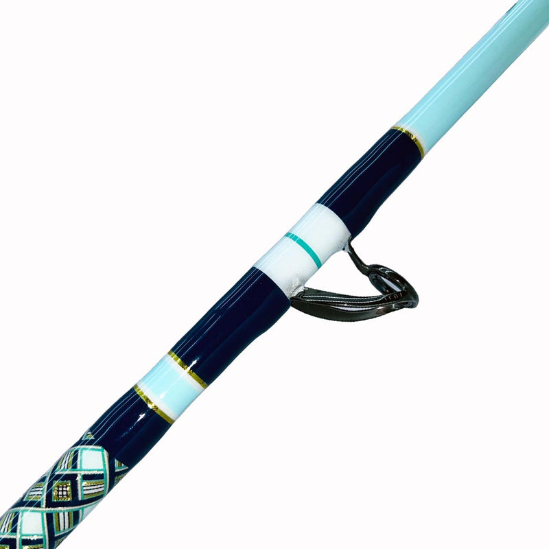 Load image into Gallery viewer, Built just like our Fin 139, this beautiful rod comes equipped with Big Game Cork, Black Winthrop Epic Butt, Fuji heavy duty guides and top. Navy blue, white, teal and gold trims and diamond pattern butt wrap showing. One guide showing. 

