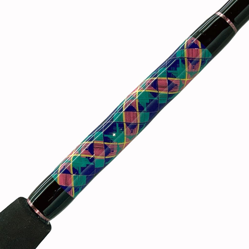 Load image into Gallery viewer, #76 Limited Edition &quot;Seas the Moment&quot; 7&#39; 30lb Spinning Rod. Butt wrap is shown from side view. Puzzle diamond pattern: pink, yellow, teal, and blue. Trims are metallic pink.
