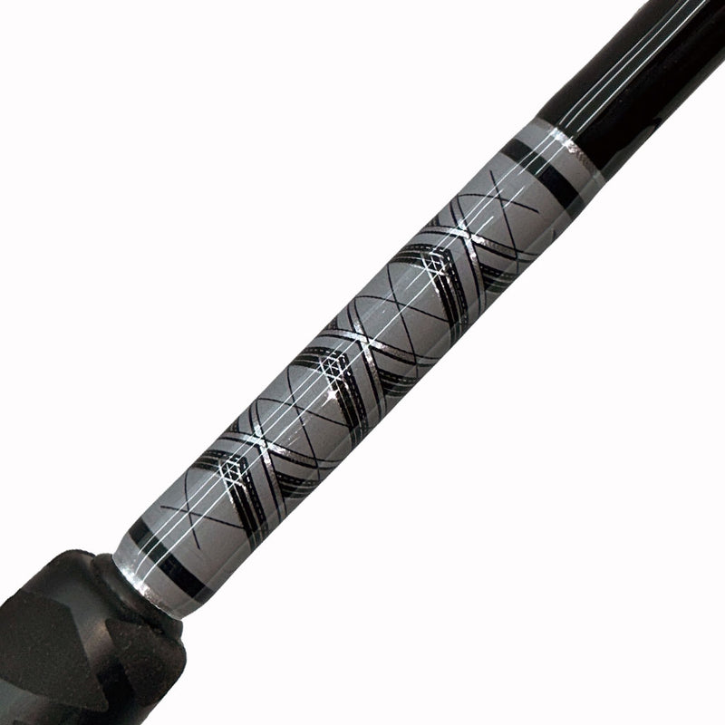 Load image into Gallery viewer, #79 Limited Edition 7&#39; 30-50lb Bottom Fishing Rod. Butt wrap shown. Diamond criss cross patterns. All gray. Black and silver diamond strands. Partial foam grip showing with heat shrink.

