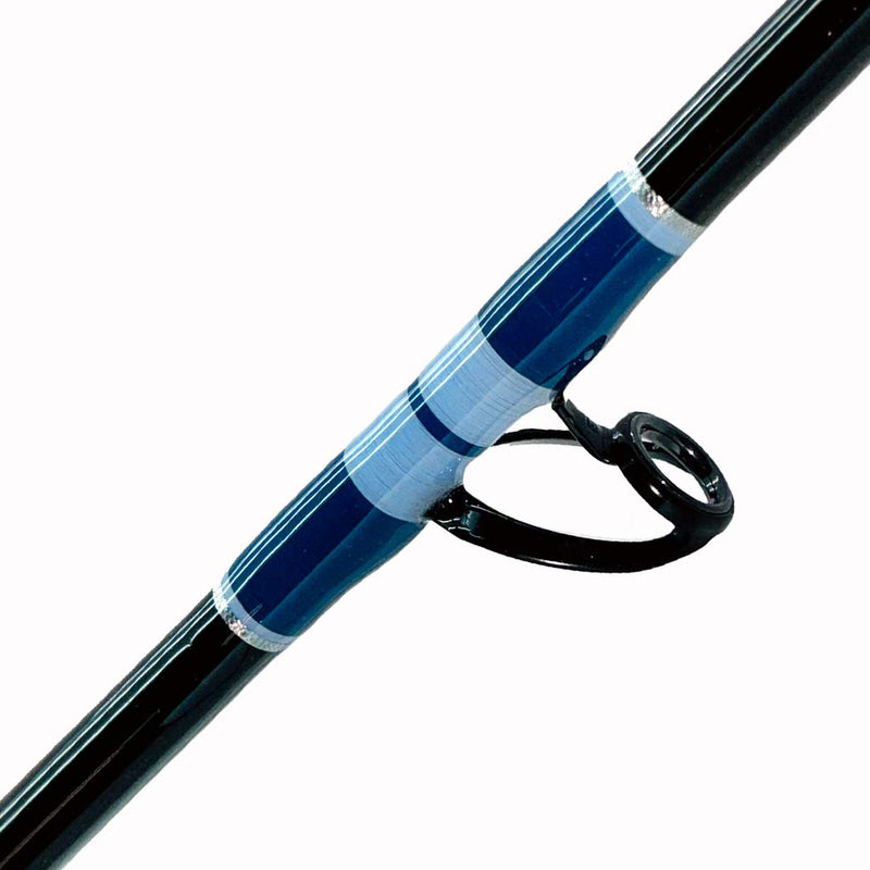 Load image into Gallery viewer, Comparable to our Blackfin Fin 184 50# Wire Line. This rod comes complete with foam grips, AFTCO swivel top, blacked out guides and a size 2 AFTCO collet and ferrule. Bottom eyelet shown from side angle. Dark and light blue with silver trims is the guide wrap. Blank is black. 
