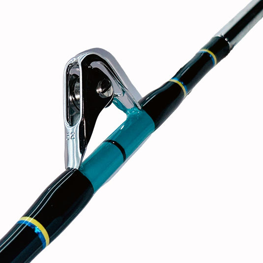 Comparable to our Fin 177 just a few inches shorter. This rod comes complete with AFTCO Swivel Top, AFTCO heavy duty guides, EVA grip, and a size 4 AFTCO Collet and Ferrule. Size 32 roller top showing. Yellow and metallic blue trims. Teal and black guide wrap. 