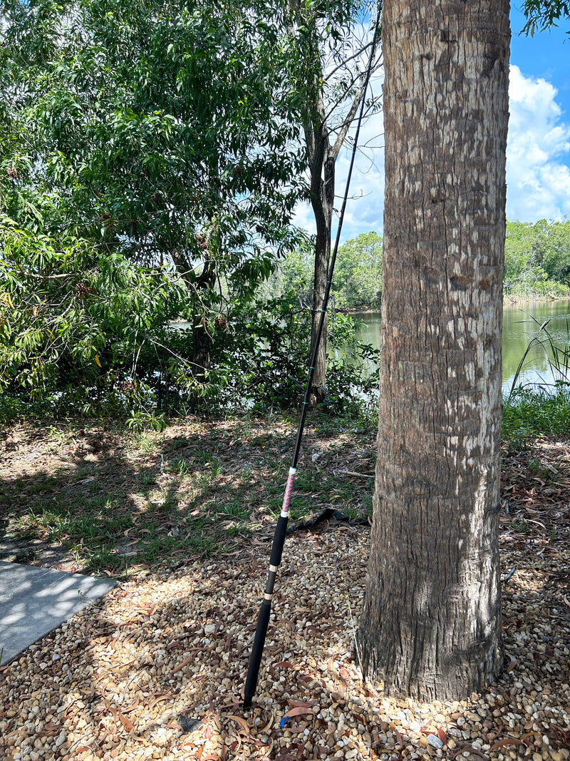 Load image into Gallery viewer, #87 Limited Edition 30lb Spin Fishing Rod. Full rod photo by the lake.
