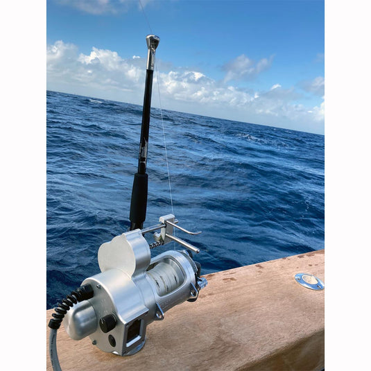 Fin 181, Hooker Electric Silver reel out on the water. 