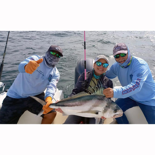 Customer catching rooster fish on Pro Pink 80