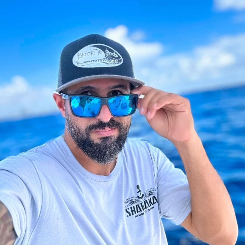 Load image into Gallery viewer, The Reel Outdoorsman sporting his Black and dark gray trucker hat!
